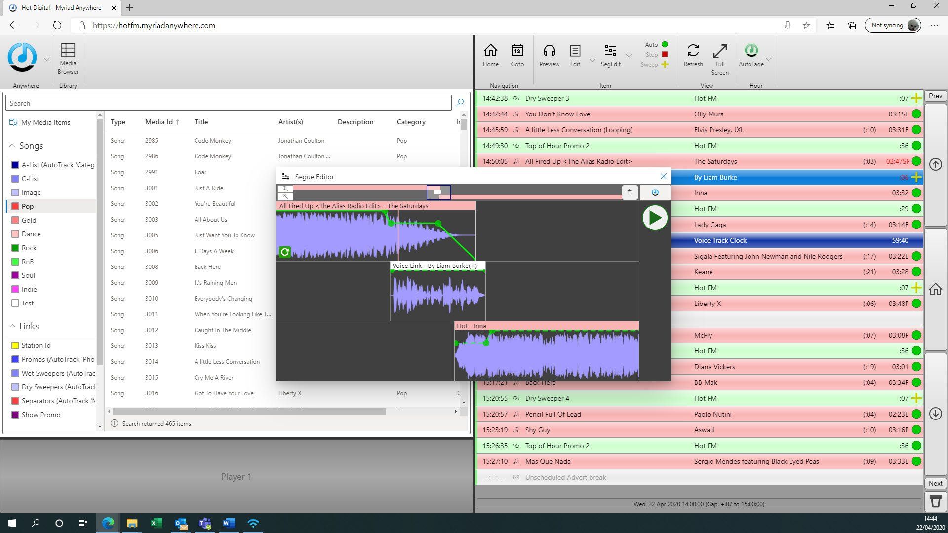 A computer screen shows a recording of a song