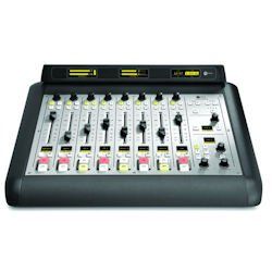 A mixer with a bunch of knobs on it on a white background.