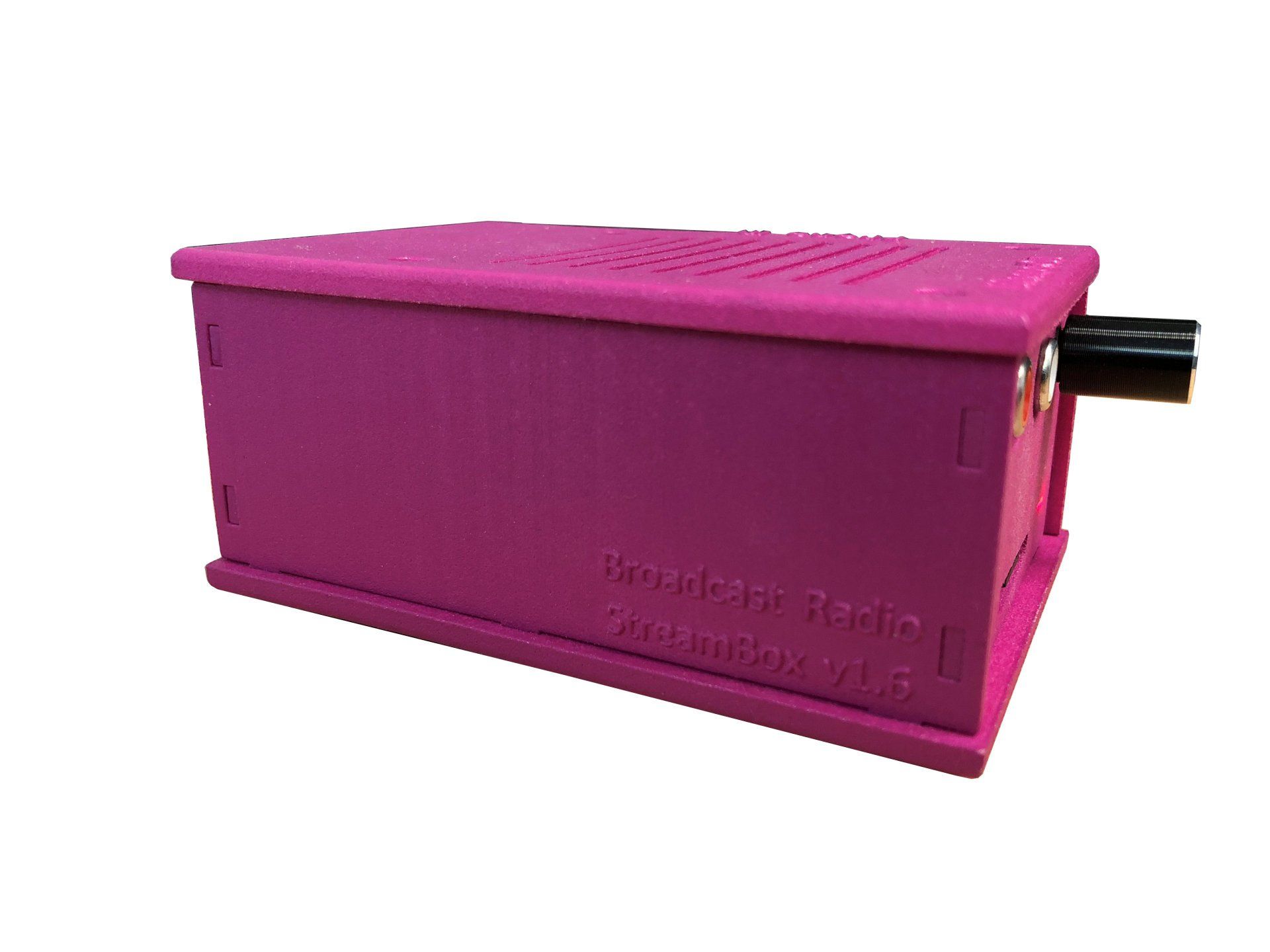 A pink box is sitting on a white surface.