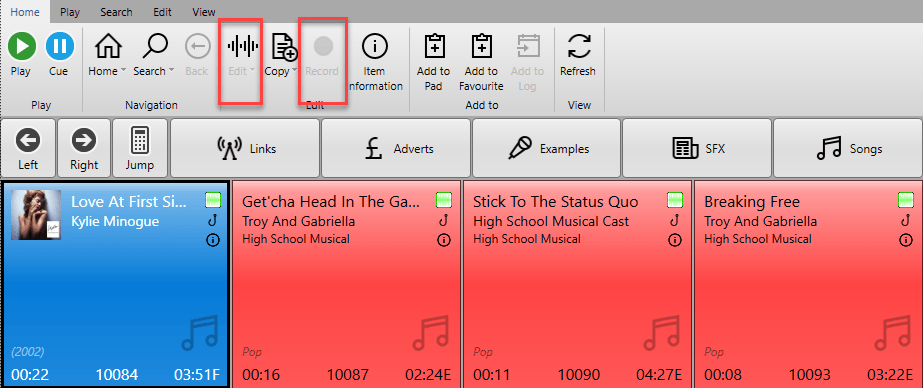 A computer screen shows a list of music tracks