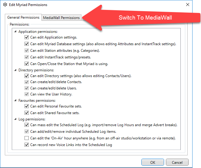 A computer screen shows a switch to mediawall button