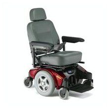 Power wheelchair with red base, gray seat, black armrests, and a headrest.