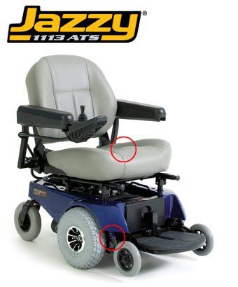 Jazzy 1113 ATS power wheelchair; blue base, gray seat, black armrests; indoor setting.