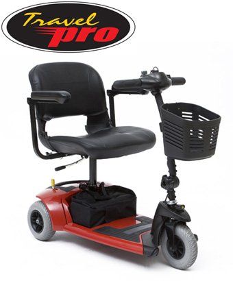 Red and black Travel Pro mobility scooter with a basket, designed for ease of movement.