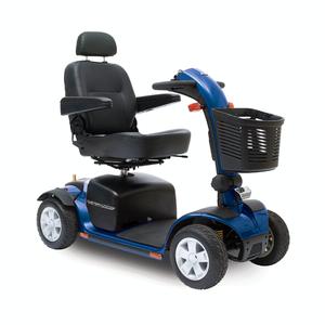 Blue mobility scooter with a black seat and basket; indoors.