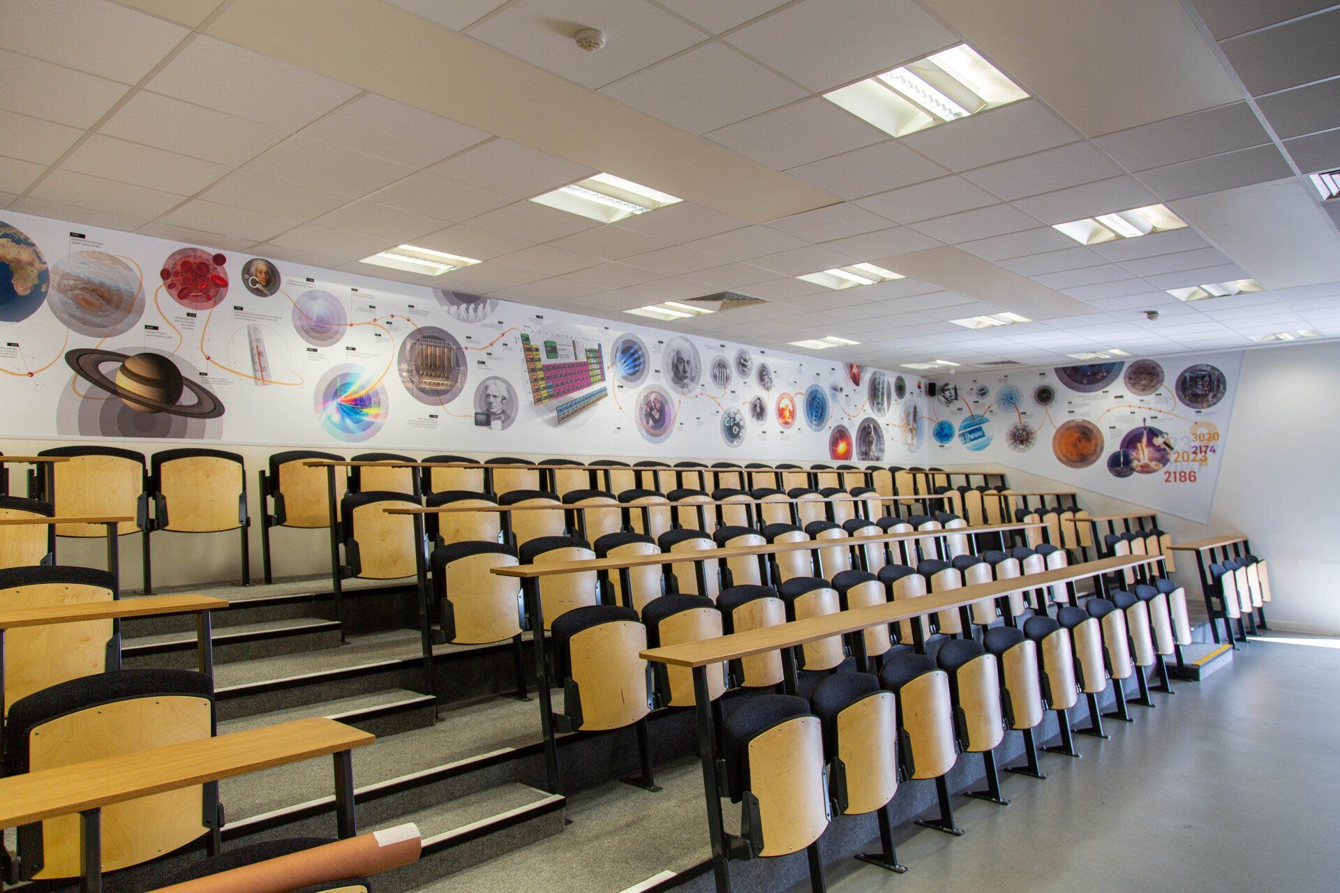 science timeline wall mural on school lecture theatre wall
