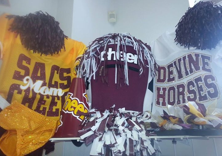 fan gear - jersey, megaphone, poms