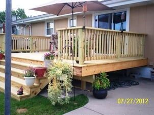 wooden Deck with plants on side - Deck builders in Dyer, IN wooden Deck with plants on side - Deck builders in Dyer, IN