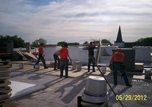 workers on commercial roof - commercial roofing in Dyer, IN workers on commercial roof - commercial roofing in Dyer, IN