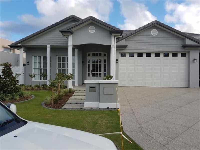 house with windows on garage door