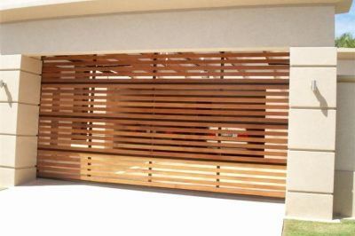 slatted cedar garage door on house