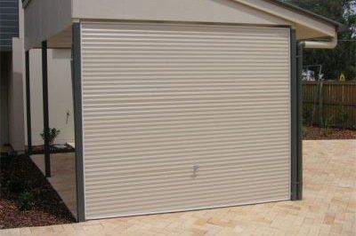 cream colored tilt style garage door