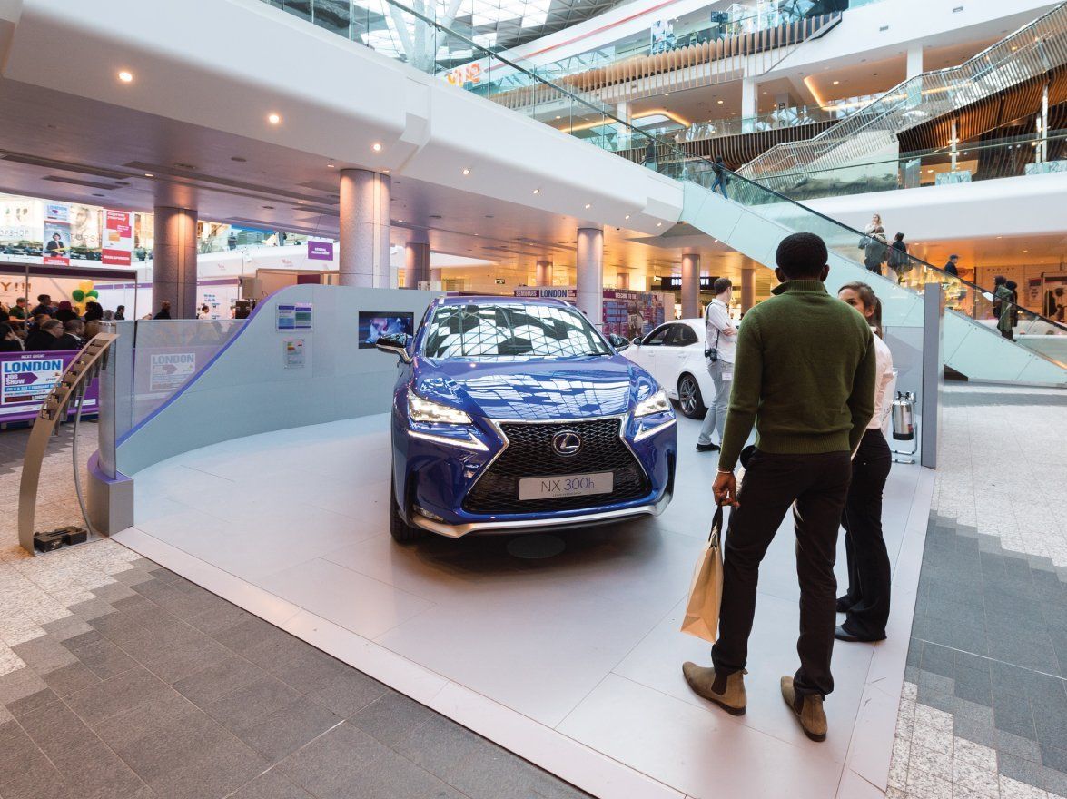 car advertising experiential marketing stand floors
