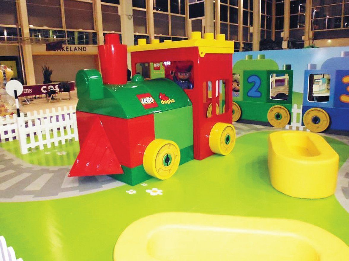 Brightly printed floor panels for brand marketing booths