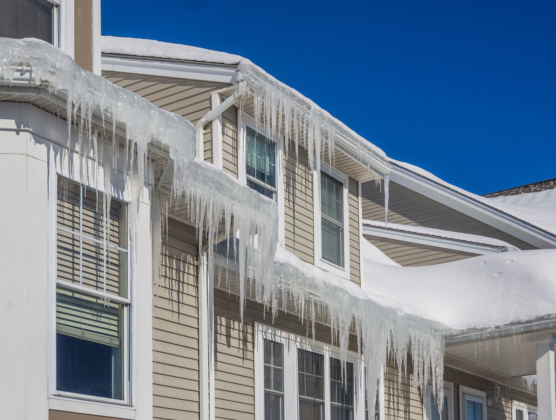 Why It Is Dangerous to Let Ice Dams Form on Your Roof