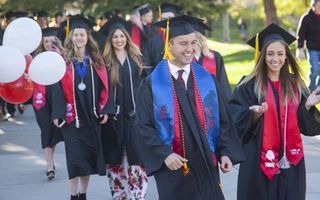 graduates of Southern Utah University after their graduation ceremony