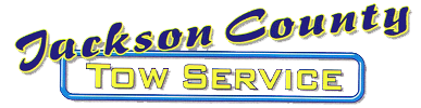 Jackson County Tow Service logo in blue and yellow text on a white background