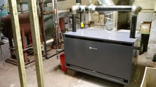 Heating & Air Conditioning — Technician Checking Air Conditioner in Pittsburg, PA