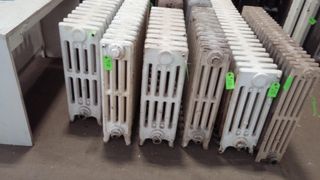 Heating Contractors — Adjusting Thermostat in Pittsburg, PA