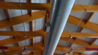 Heating & Air Conditioning — Technician Checking Air Conditioner in Pittsburg, PA