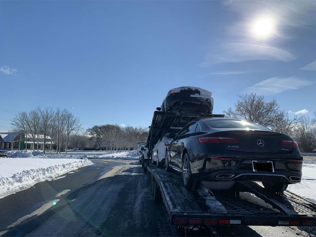 Vehicle Transport — Long Car Trailer Truck on the Road in Chicago, IL Vehicle Transport — Long Car Trailer Truck on the Road in Chicago, IL