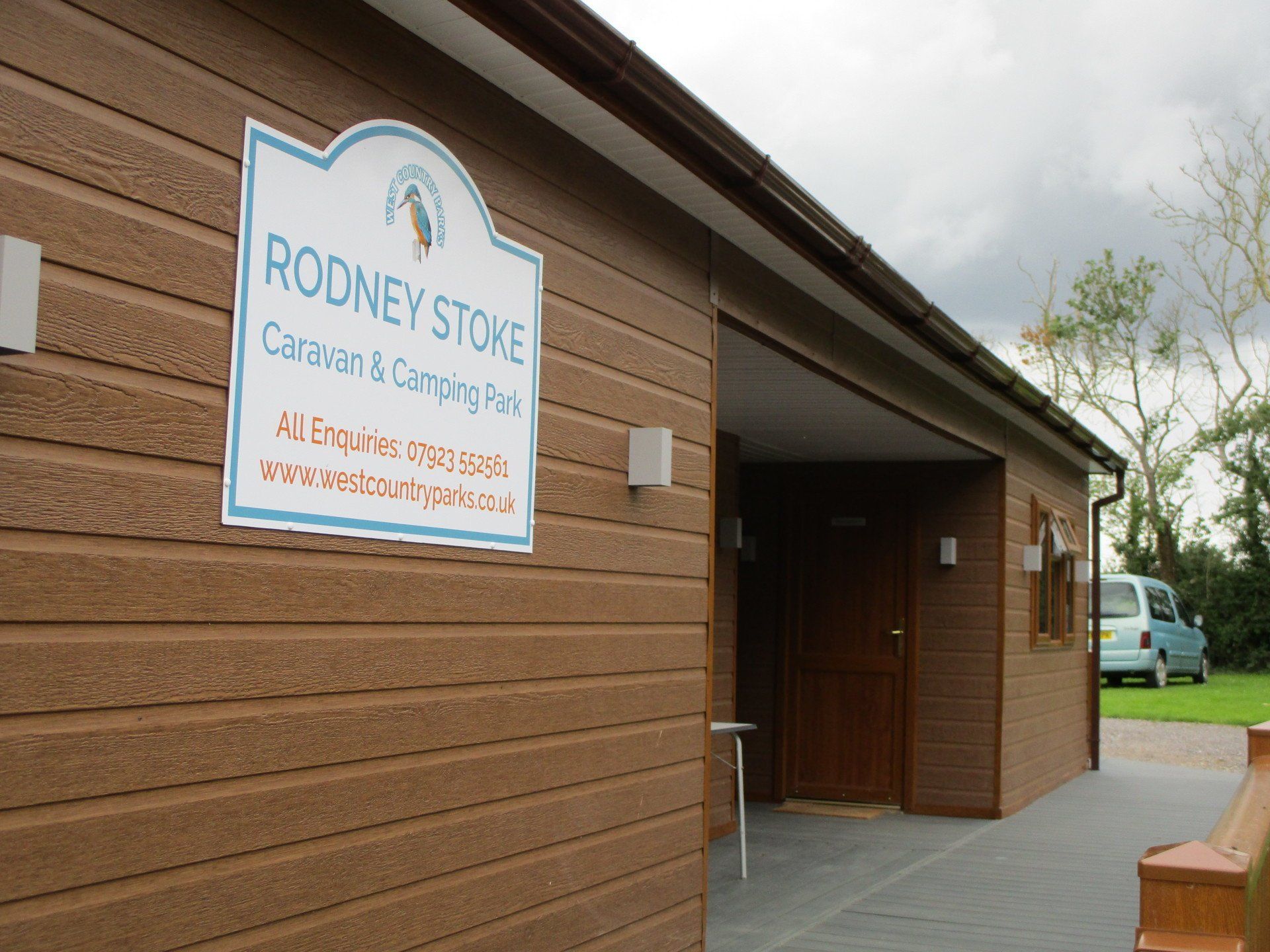 Close picture of Cheddar caravan park facilities building.