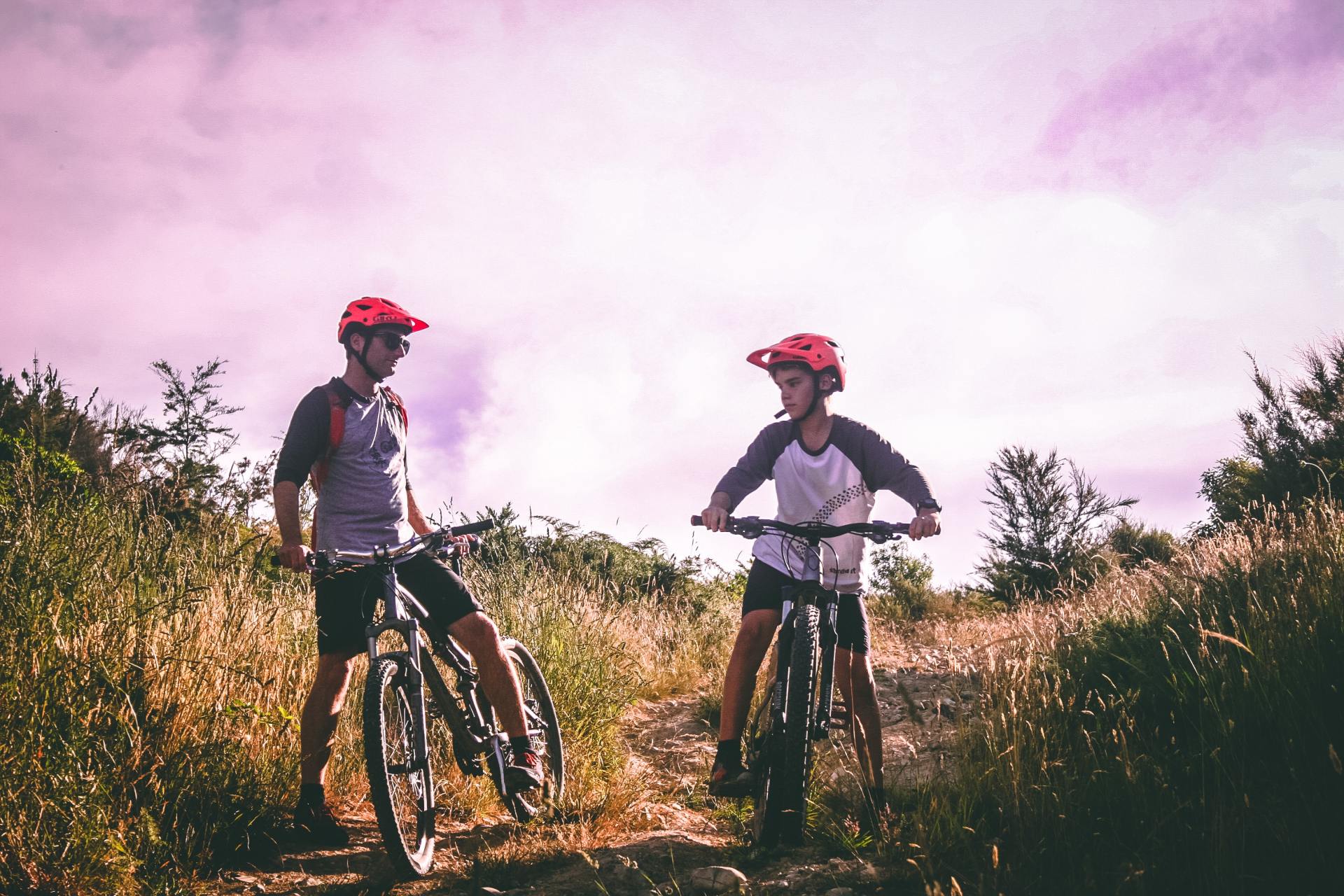 Two boys on mountain bikes on a day out while staying in Somerset.