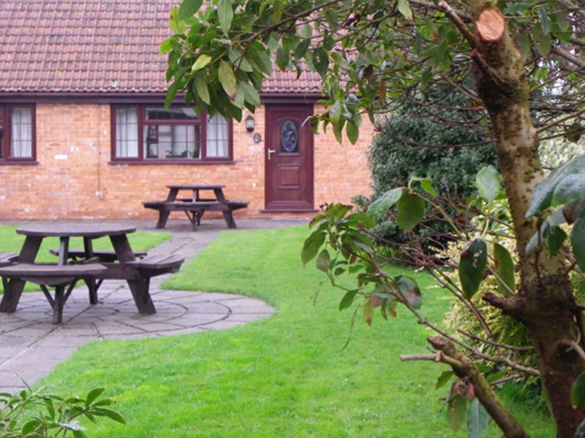 Outside red brick holiday cottage in Burnham-on-Sea Somerset.