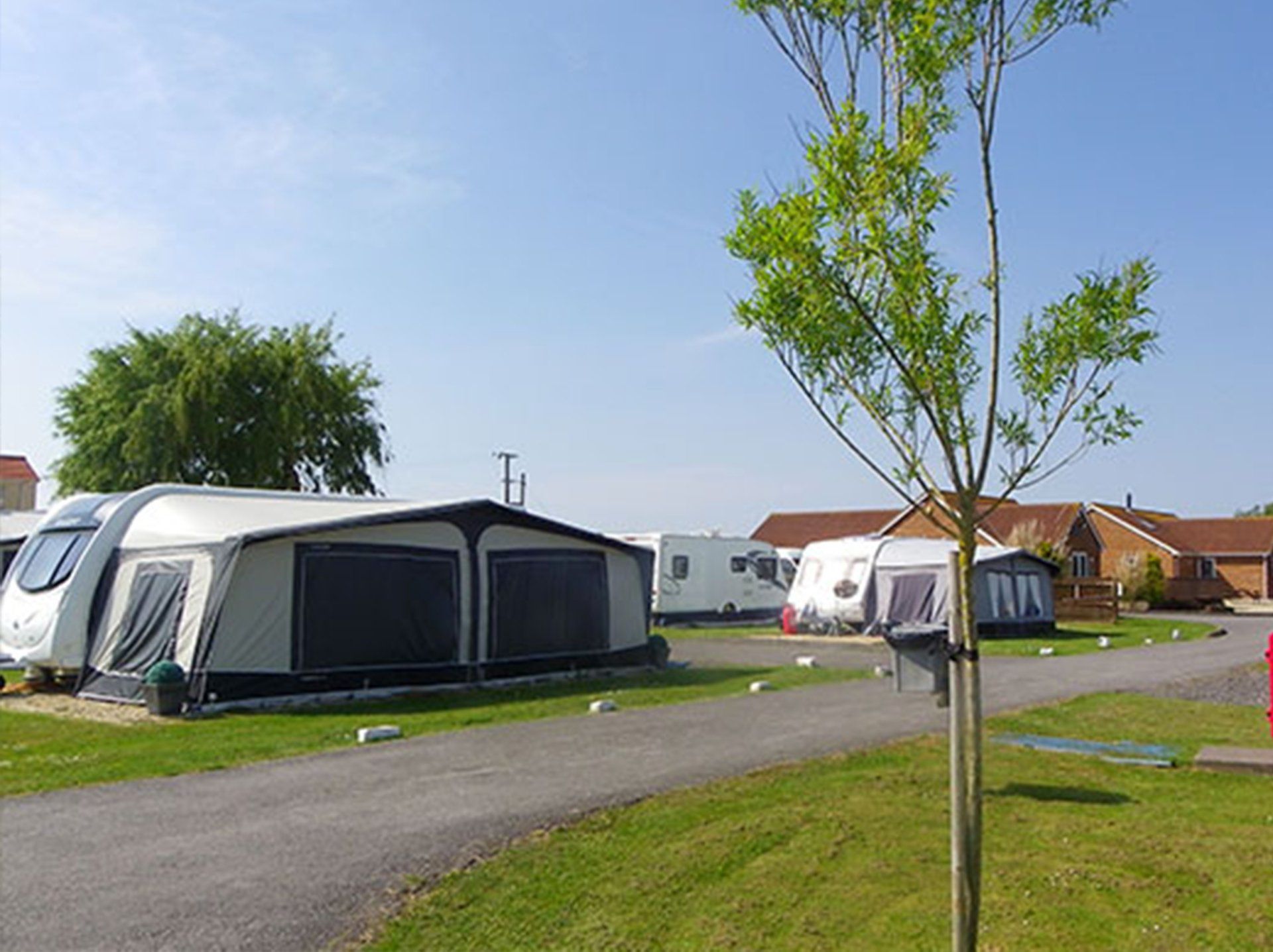 Touring caravans at Rose Farm caravan park near Burnham-on-Sea