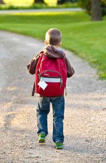 Kid with Back Pack — St. Cloud, MN — Minser Chiropractic Clinic Kid with Back Pack — St. Cloud, MN — Minser Chiropractic Clinic