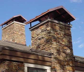 Chimneys Repair — Two Chimney with Roof Caps in Lititz, PA Chimneys Repair — Two Chimney with Roof Caps in Lititz, PA