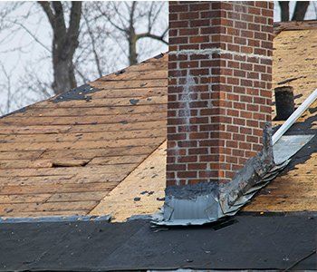 Repair To Chimney — Damaged and old roofing shingles on a house in Lititz, PA Repair To Chimney — Damaged and old roofing shingles on a house in Lititz, PA