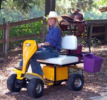 A woman in a cowboy hat is sitting on a yellow scooter