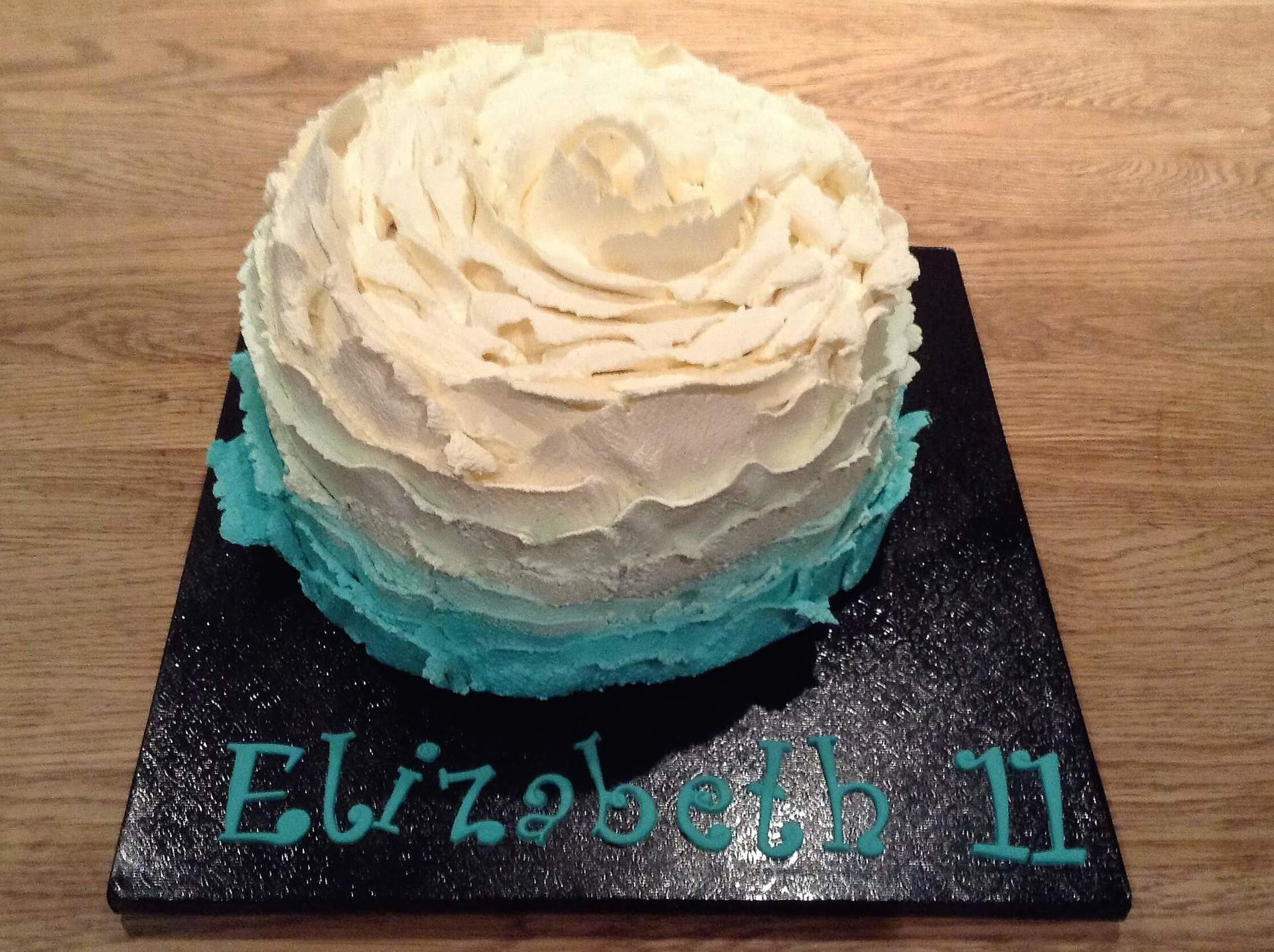 white creamy birthday cake
