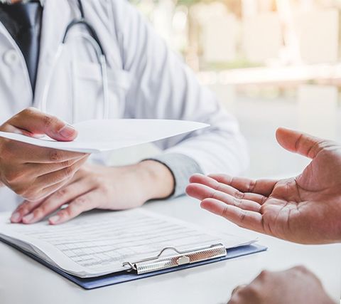 Doctor Hand Over Prescriptions — Decatur, AL — Decatur Internal Medicine & Aesthetics Doctor Hand Over Prescriptions — Decatur, AL — Decatur Internal Medicine & Aesthetics