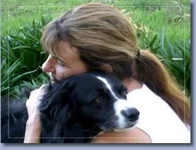 person holding dog