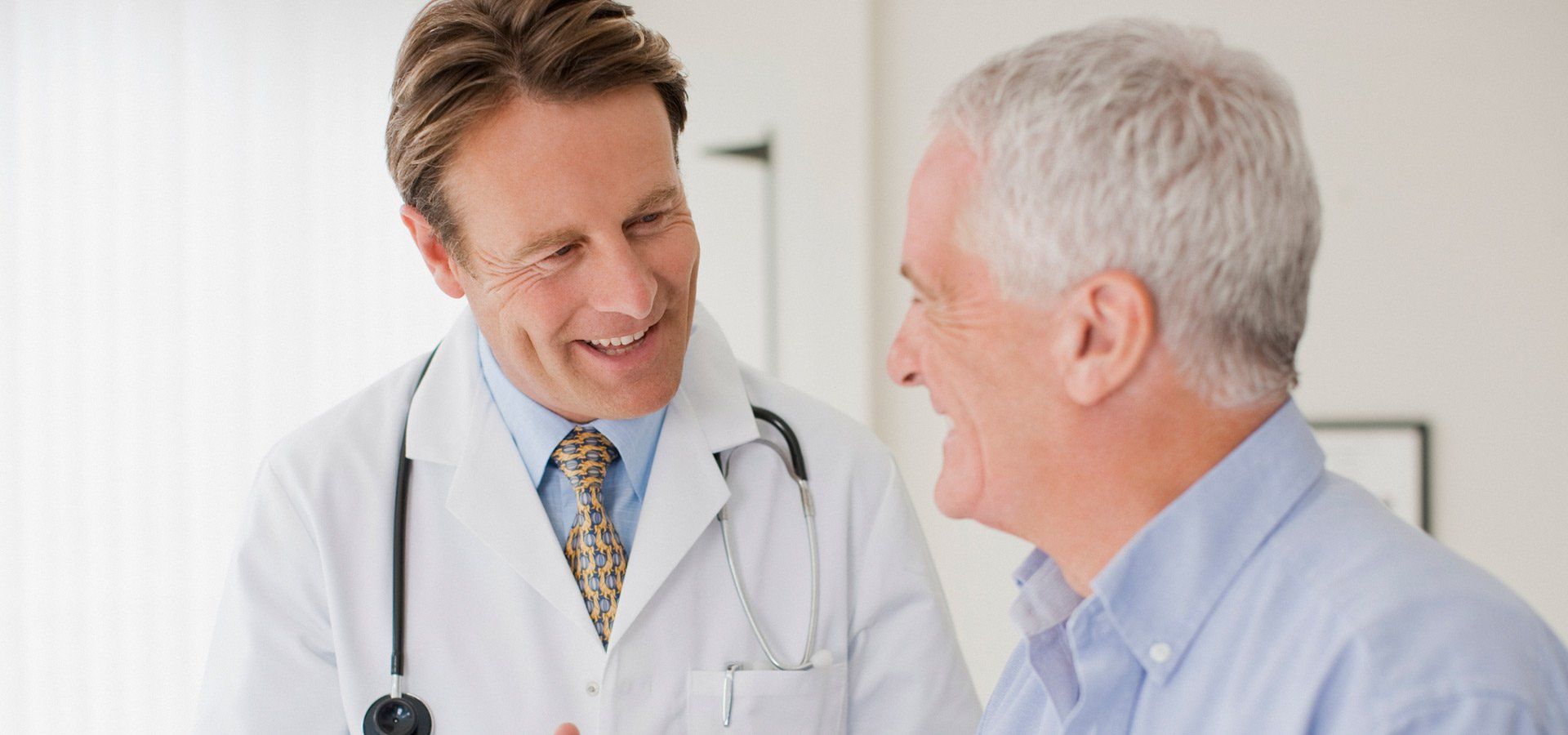 Doctor with a old man