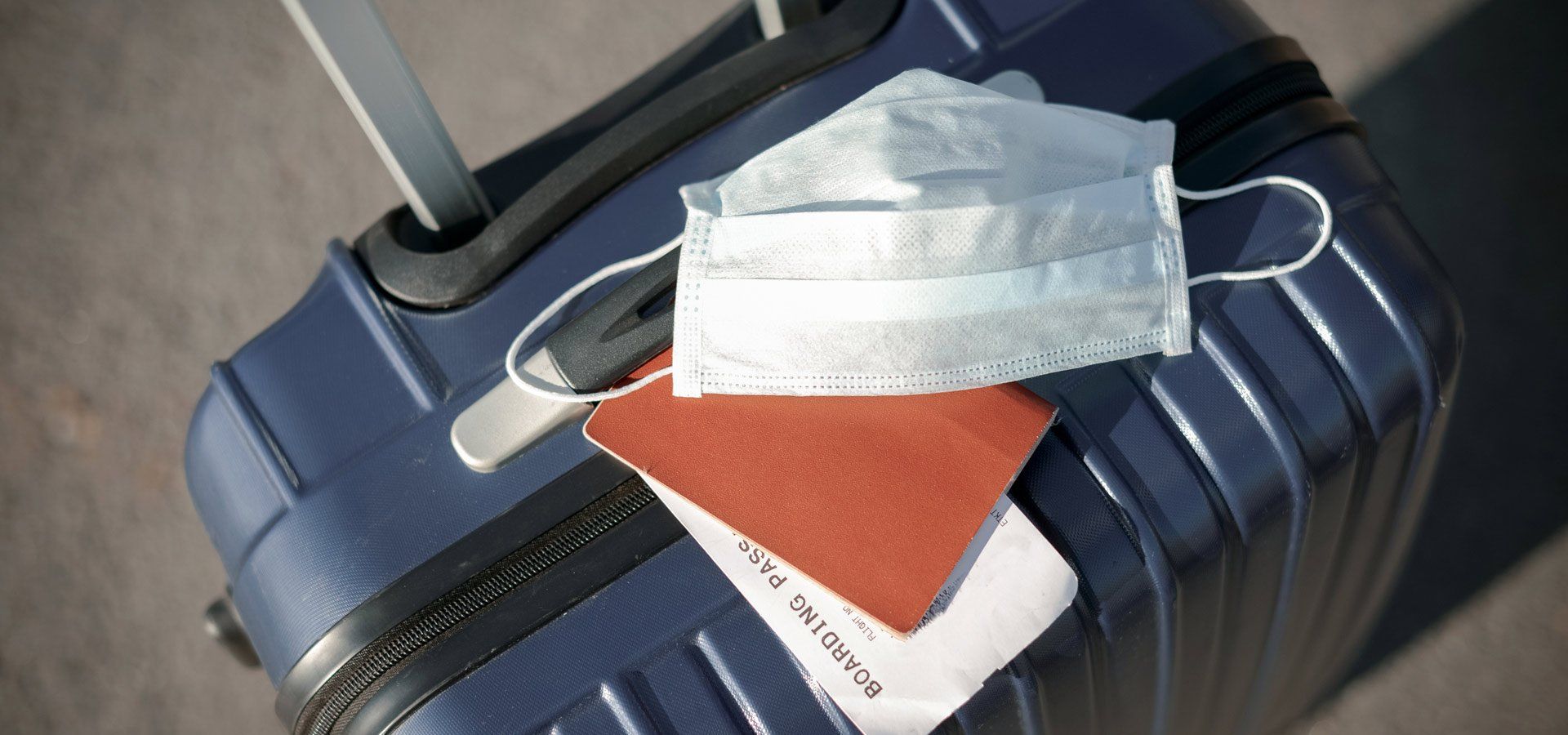 mask, passport with trolley