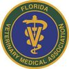 Florida Veterinary Medical Association logo: blue circle with gold medical symbol and text on a green and gold ring.