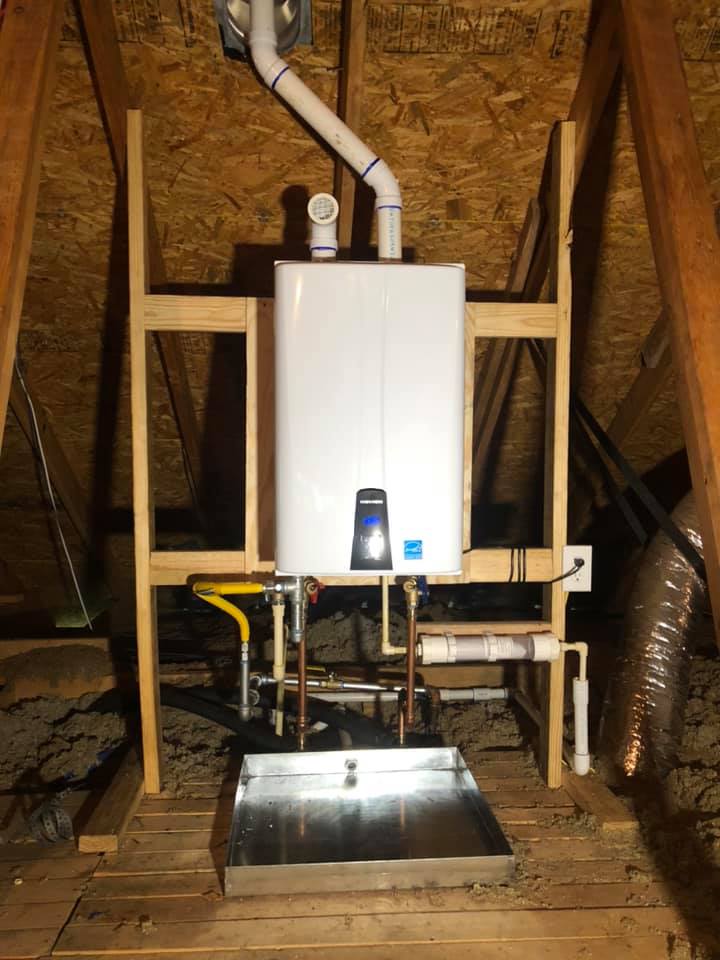 Installing New Tankless Heater — Houston, TX — All The Time Plumbing