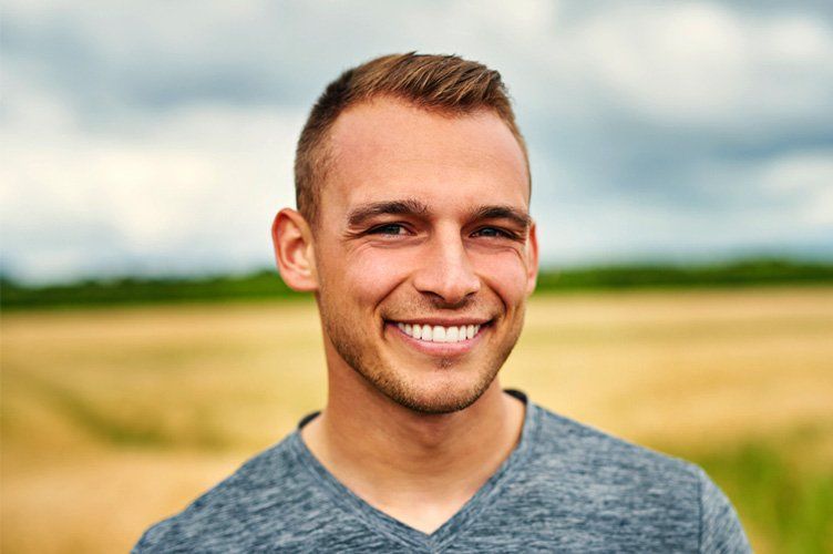 Young man smiling for Photo in Round Rock, TX