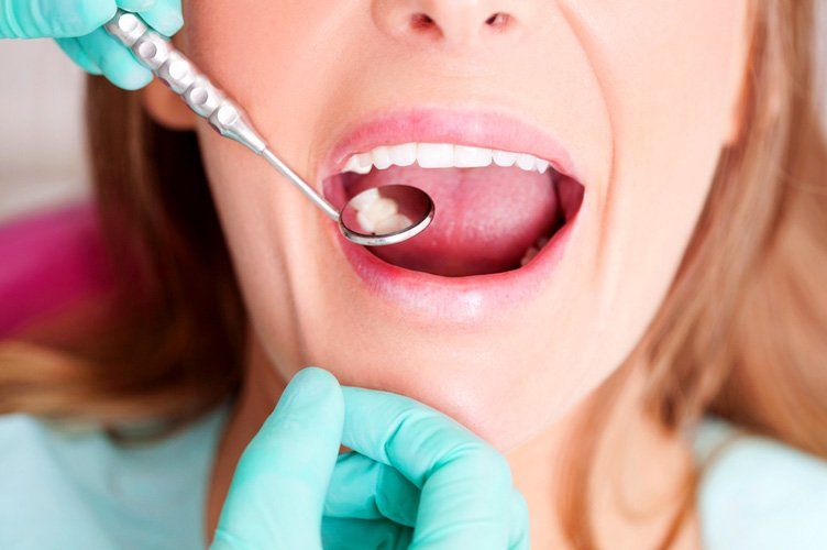 Woman recieving a Dental Exam at Transcend Dental Health