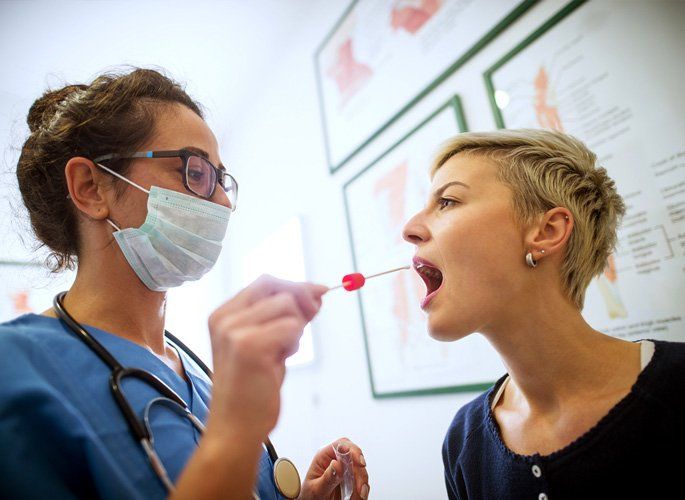 Young woman receiving a Dental Exam in Round Rock, TX