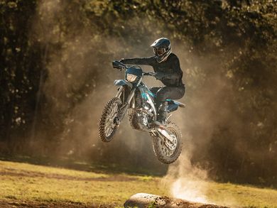 Man On Dirt Bike — Atlas Super Store in Mount Isa, QLD