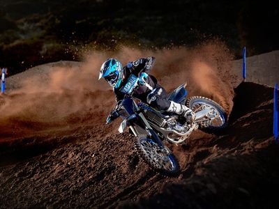 Three Motocross Riders — Atlas Super Store in Mount Isa, QLD Three Motocross Riders— Atlas Super Store in Mount Isa, QLD