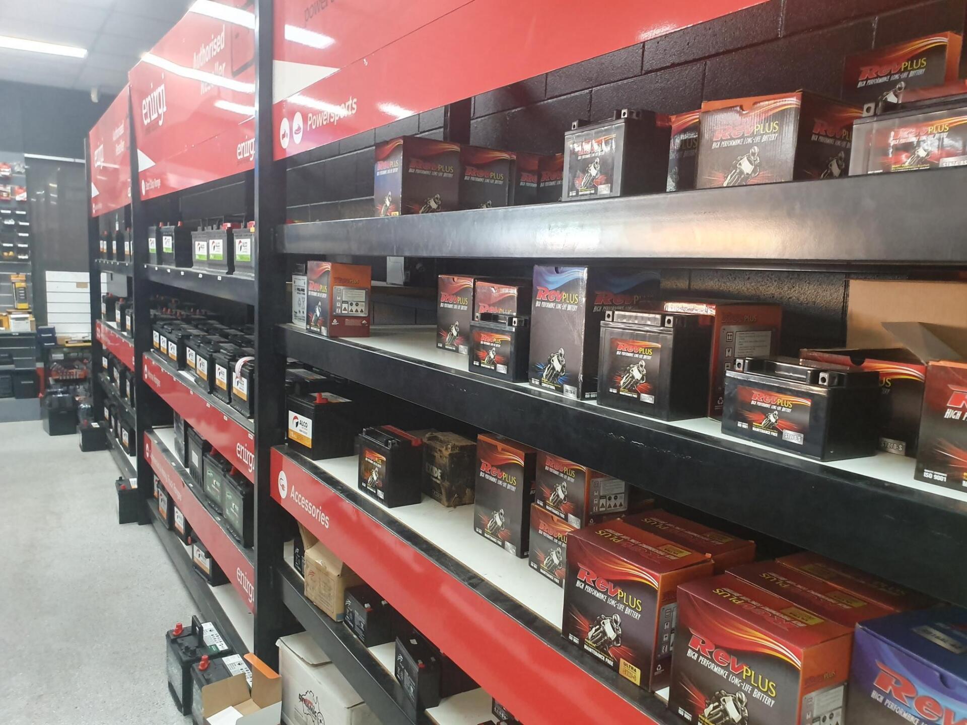 Vehicle Batteries Stack On Shelf — Atlas Super Store in Mount Isa, QLD Vehicle Batteries Stack On Shelf — Atlas Super Store in Mount Isa, QLD