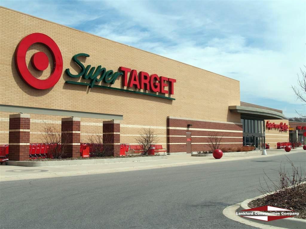 A super target store with a red and green sign
