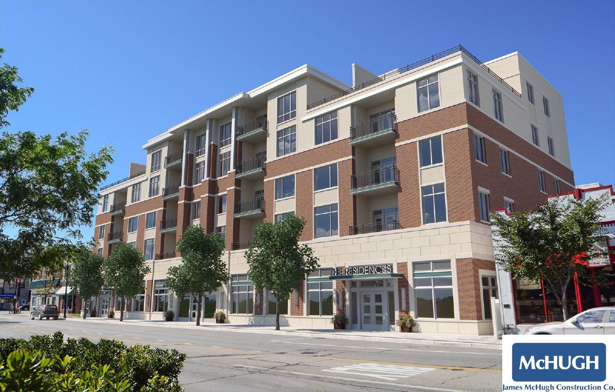 A large building with a sign that says mchugh on it