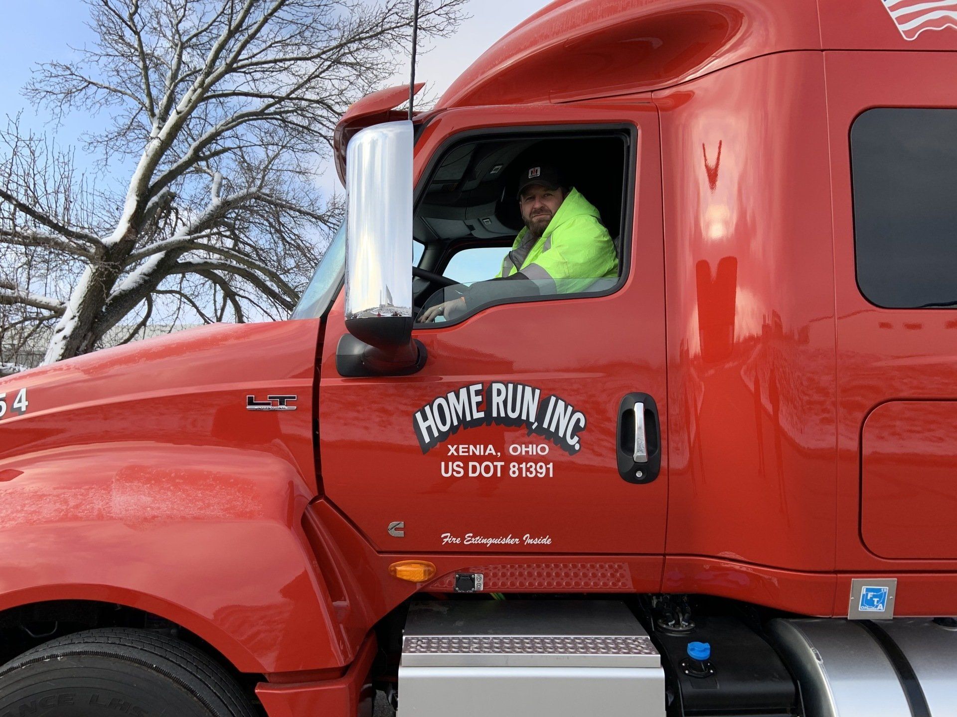 Driver standing near truck