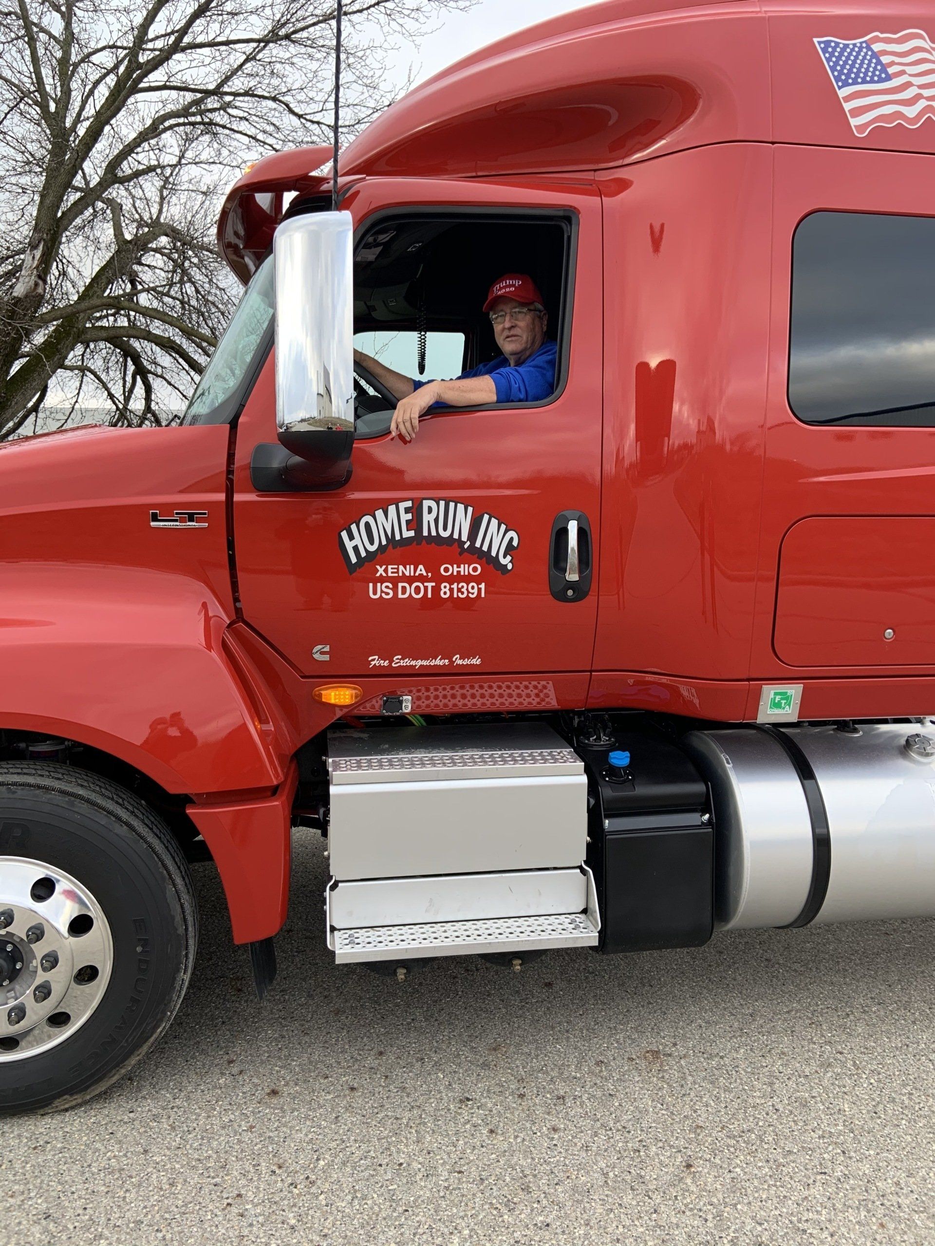 Driver reviewing papers on clipboard